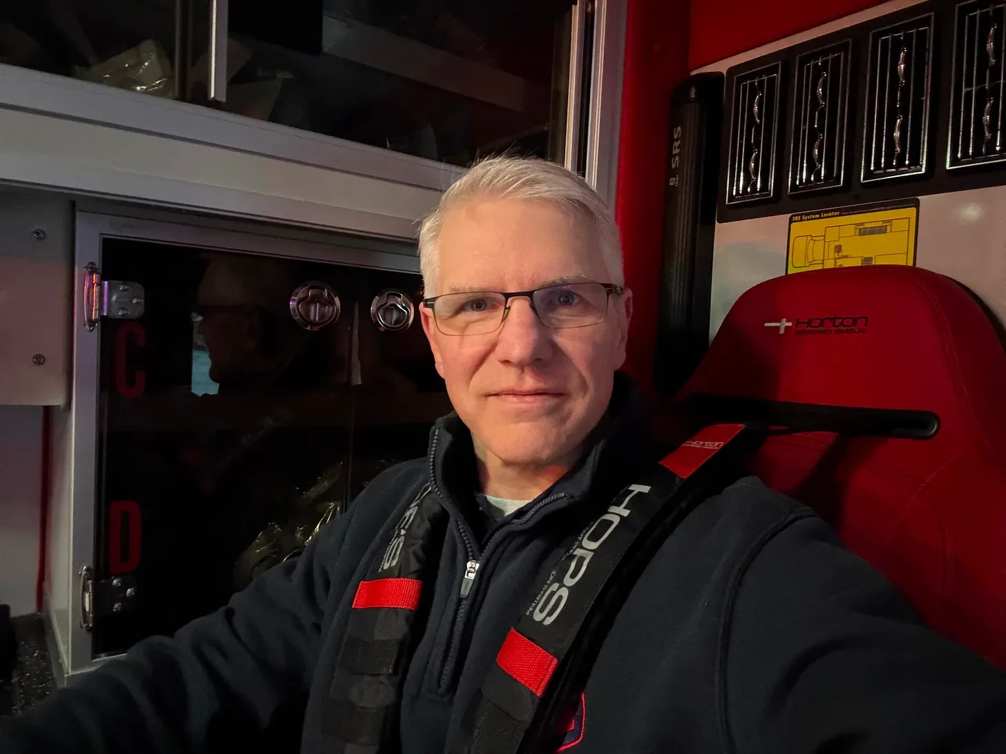 Andrew Flynn at the fire station where he serves as a volunteer firefighter and EMT.